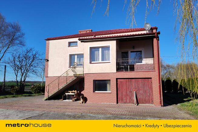 Dom na wsi z dużą działką i zabudowaniami gospodar