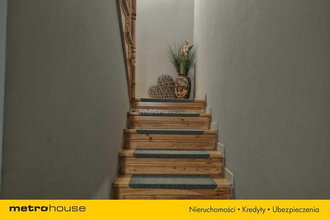 Trzypoziomowa kamienica z lokalem handlowym.