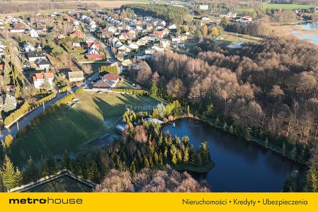 Działka budowlana ze stawem i wiatą w Rybnie.