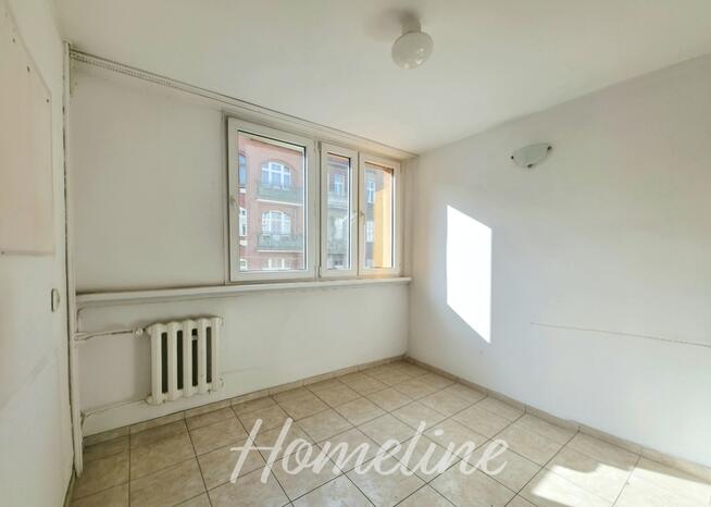 Słoneczne rozkładowe mieszkanie przy cichej ulicy