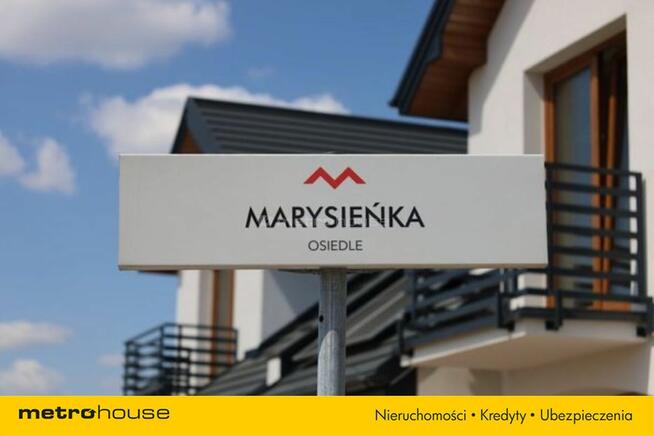 Połowa bliźniaka z garażem - stan surowy otwarty