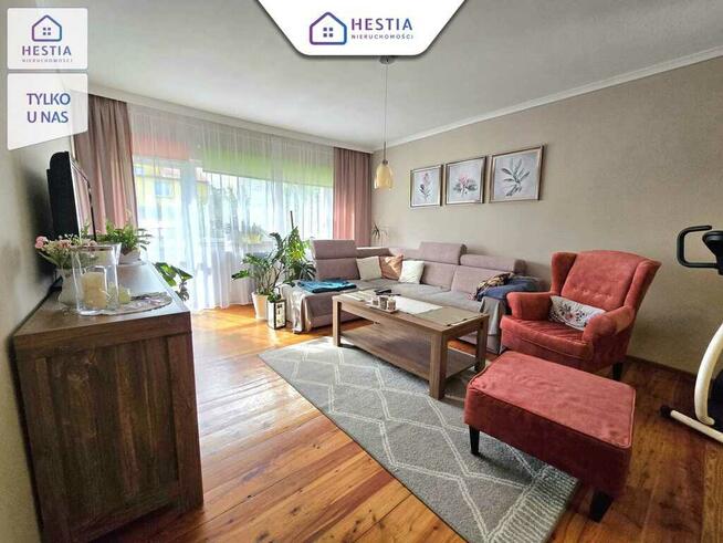 Mieszkanie na parterze z balkonem i garażem.