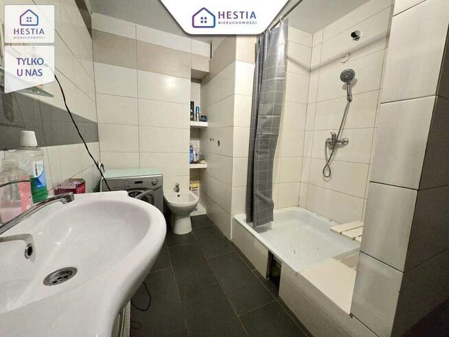 Mieszkanie na parterze z balkonem i garażem.