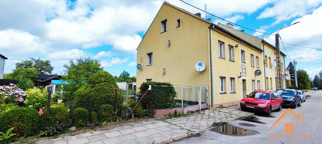 dwa mieszkania z garażami