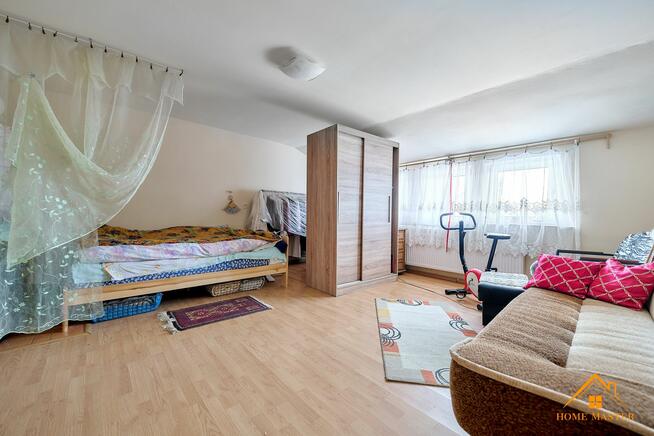 Bezczynszowy segment z garażem i 2 ogrodami – Twój azyl przy jeziorach Lisnówko