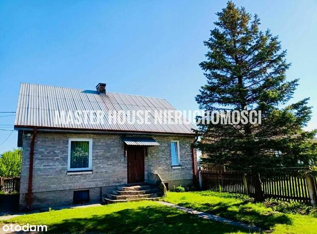 Dom z zabudowaniami 14 km od Ostrowca Św.