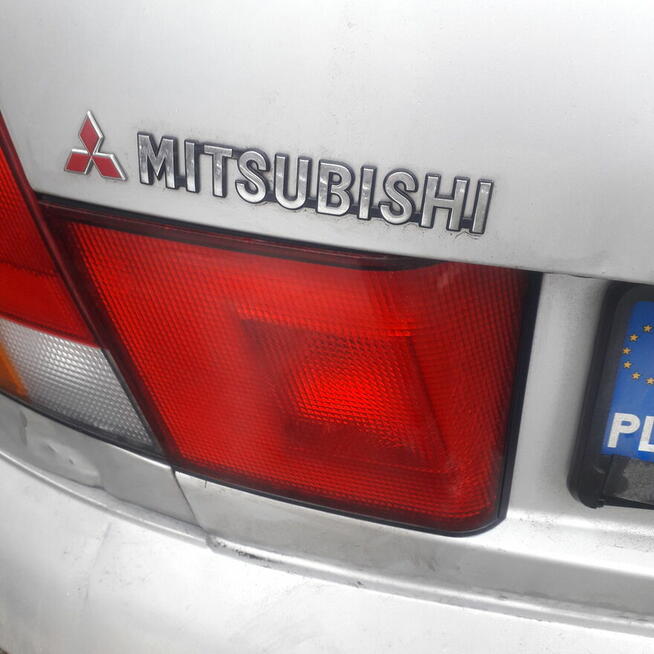 Komplet tylnych lamp błotników klapy Carisma 95-99r