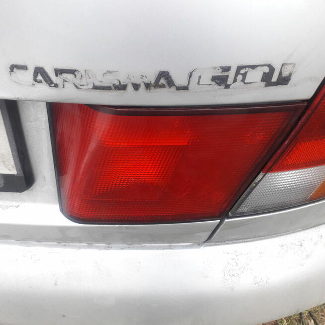 Komplet tylnych lamp błotników klapy Carisma 95-99r