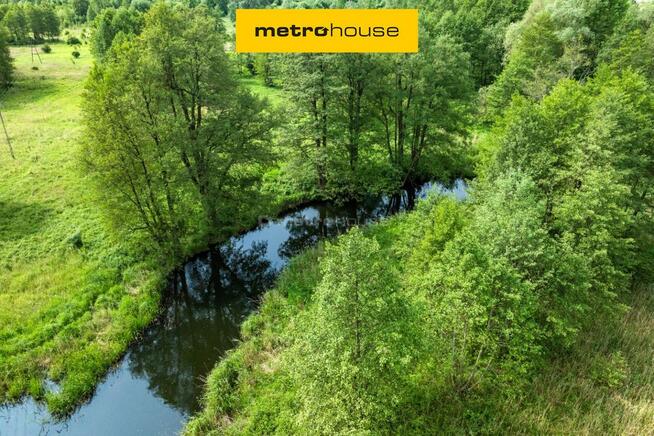 Działka z linią brzegową rzeki Pisy