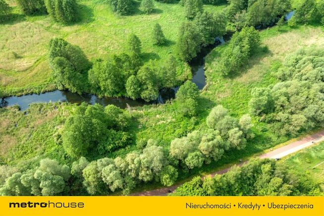 Działka z linią brzegową rzeki Pisy