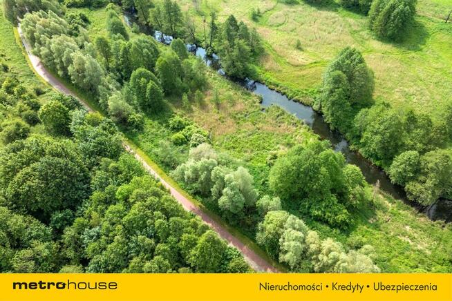 Działka z linią brzegową rzeki Pisy