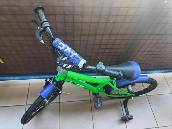 Rowerek dziecięcy zielony w dobrym stanie.