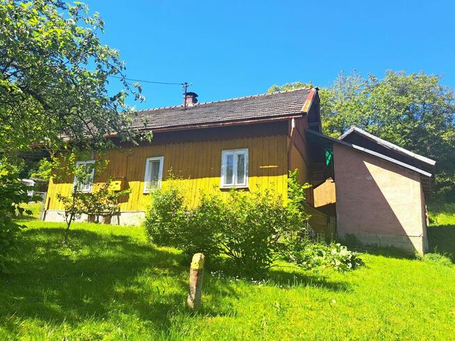 Dom drewniany 77 mkw. na działkach 9,92 ar Sanok Wójtostwo