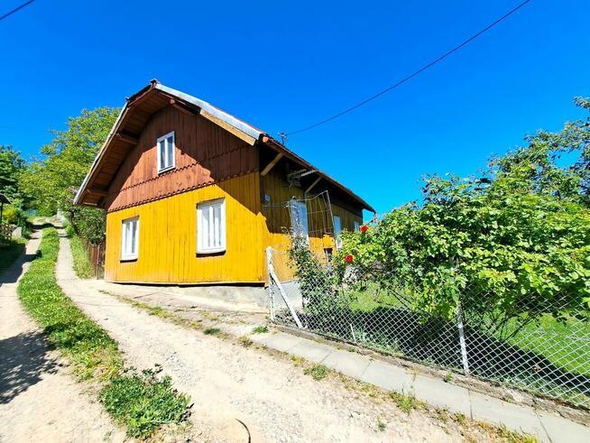 Dom drewniany 77 mkw. na działkach 9,92 ar Sanok Wójtostwo