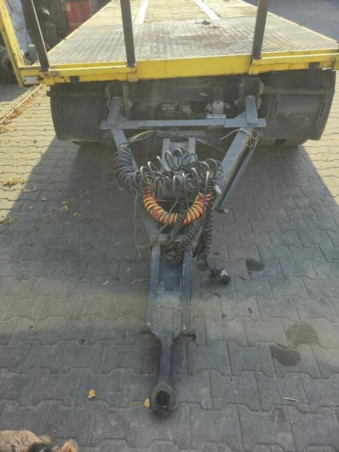 Przyczepa niskopodwoziowa 24tDMC z najazdami i burtami