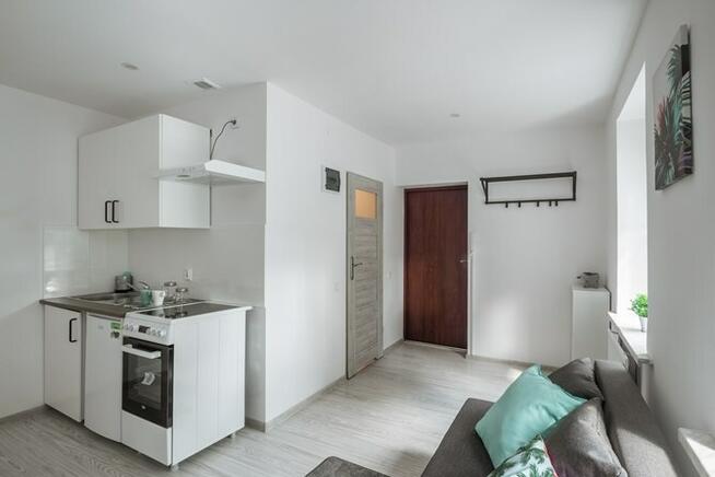 Wielka 12, Pogoń, funkcjonalna kawalerka