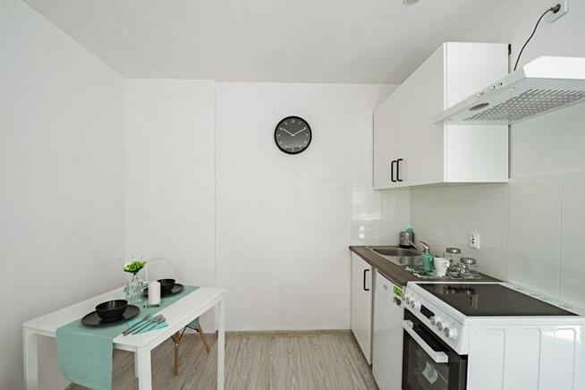 Wielka 12, Pogoń, funkcjonalna kawalerka