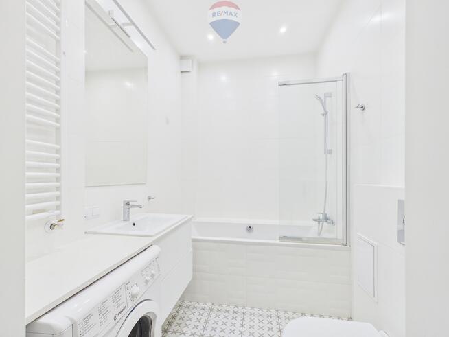 Dwupokojowe, nieumeblowane mieszkanie w kamienicy