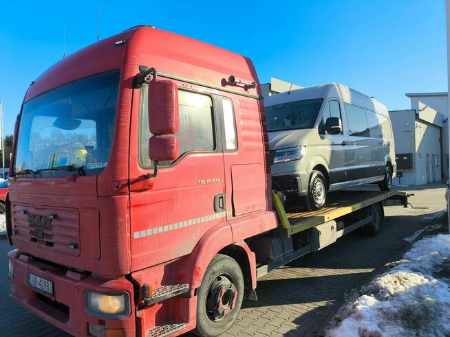 Transport maszyn rolniczych i budowlanych, autopomoc, laweta