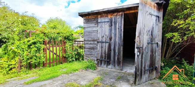 dwa mieszkania z garażami