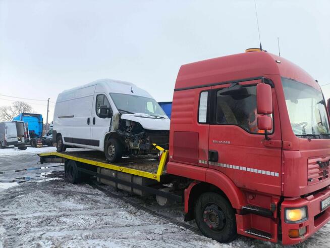 Transport maszyn rolniczych i budowlanych, autopomoc, laweta