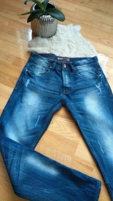 Spodnie dżinsy niebieskie Alcott przecierane slim S / M