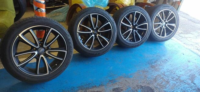 sprzedam felgi aluminiowe 18 z oponami letnimi