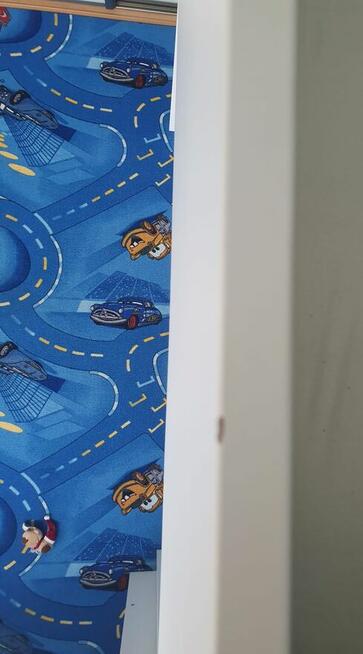 Łóżko piętrowe z szafką, biurkiem i materacem