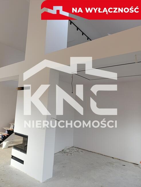 Nowy dom parterowy z antresolą.