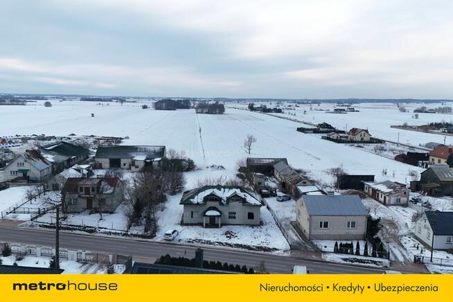 Duża działka z domem w stanie surowym