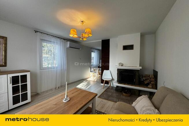 Dom z klimatyzacją i solarem_Niskie rachunki.