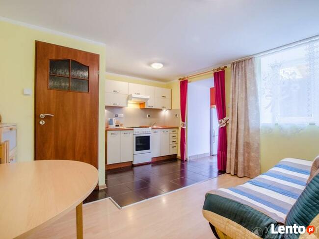 Domki Pionat Ryn Rybical Mazury jezioro noclegi wakacje