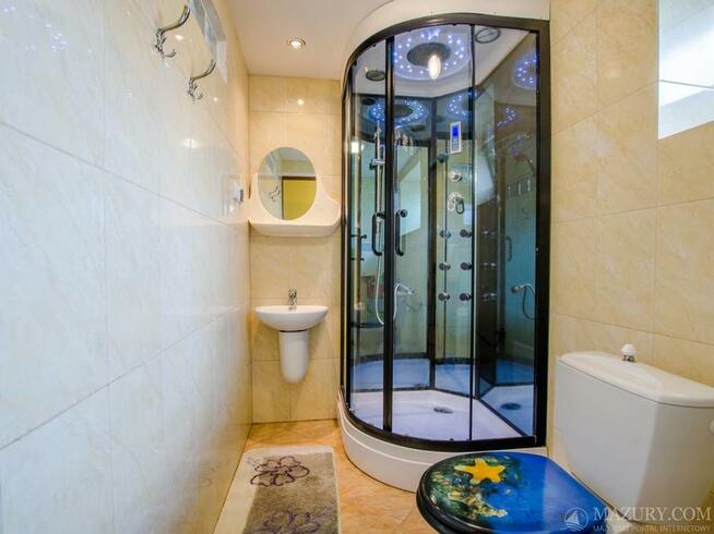 Domki Pionat Ryn Rybical Mazury jezioro noclegi wakacje