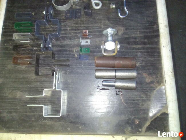 Kapturki obejmy napinacze zawiasy