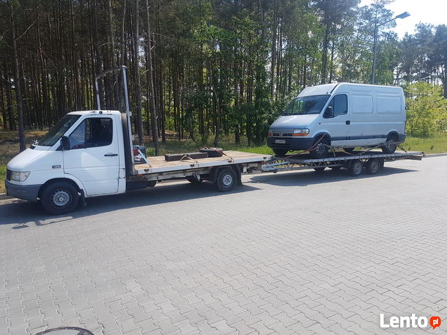 TRANSPORT MASZYN ROLNICZYCH TRAKTOROW kombajnów pomoc drogow