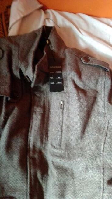 Sprzedam nowy męski płaszcz wiosenny ,80 procent wełna.XXL.