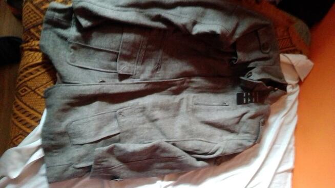 Sprzedam nowy męski płaszcz wiosenny ,80 procent wełna.XXL.