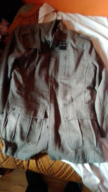Sprzedam nowy męski płaszcz wiosenny ,80 procent wełna.XXL.