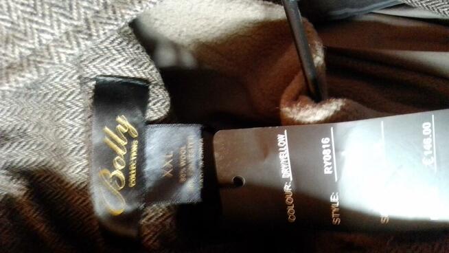 Sprzedam nowy męski płaszcz wiosenny ,80 procent wełna.XXL.