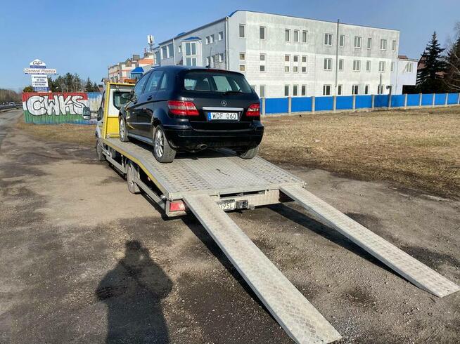 Pomoc drogowa 24h Warszawa Holowanie Aut Autopomoc Laweta