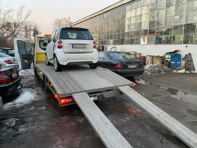 Pomoc drogowa 24h Warszawa Holowanie Aut Autopomoc Laweta