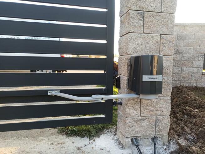 Systemy alarmowe - kamery - napędy do bram - domofony