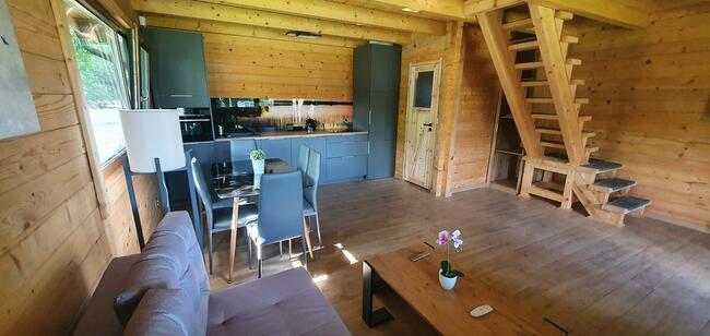 Domki domek z bala przy plaży nad jeziorem Głuszyńskim Orle