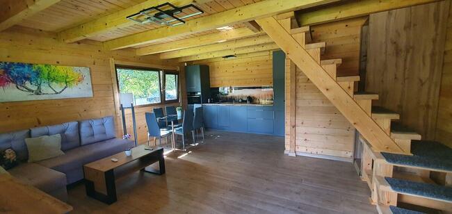 Domki domek z bala przy plaży nad jeziorem Głuszyńskim Orle