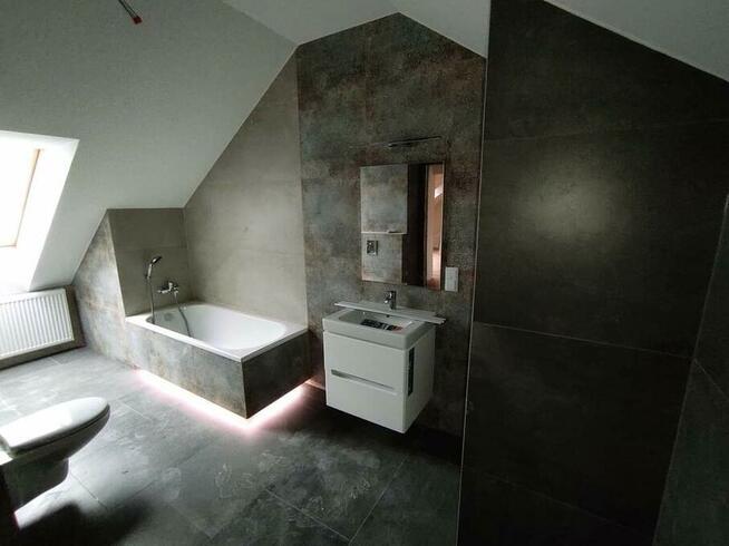 Fliziarz glazurnik oferuje swoje usługi wykończenia wnętrz