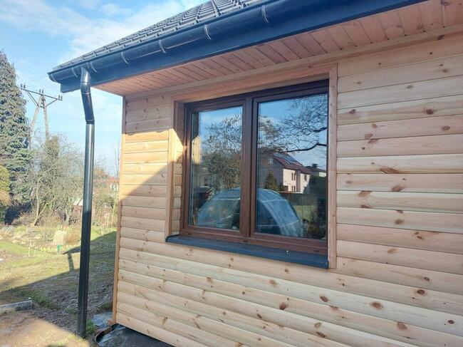 Elewacje drewniane remo domów drewnianych, ciesielstwo stola