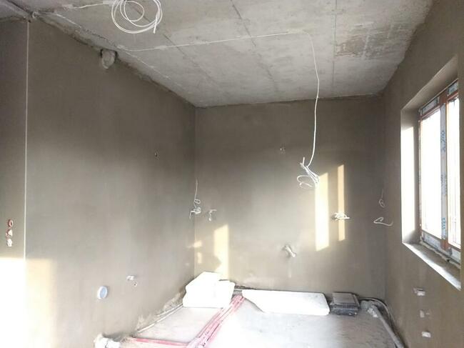 Tynki wewnętrzne gipsowe cementowo wapienne