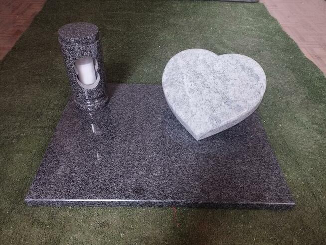 Granitowe wazony, lampiony, drewniane obudowy na grob