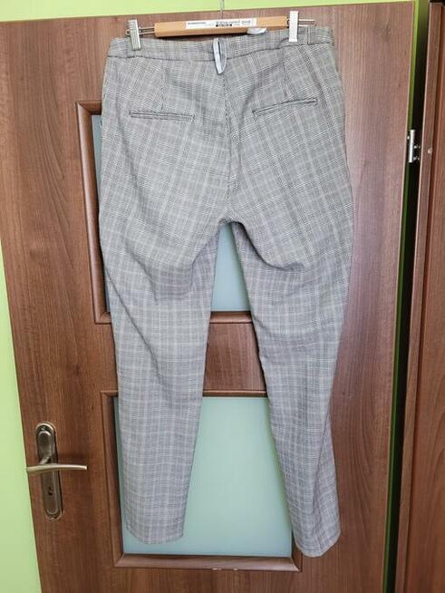 Spodnie eleganckie damskie w kratę