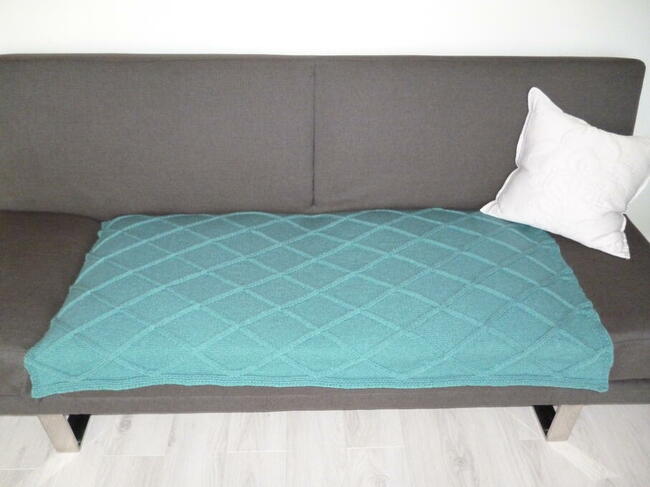 Narzuta na kanapę lub wersalkę.